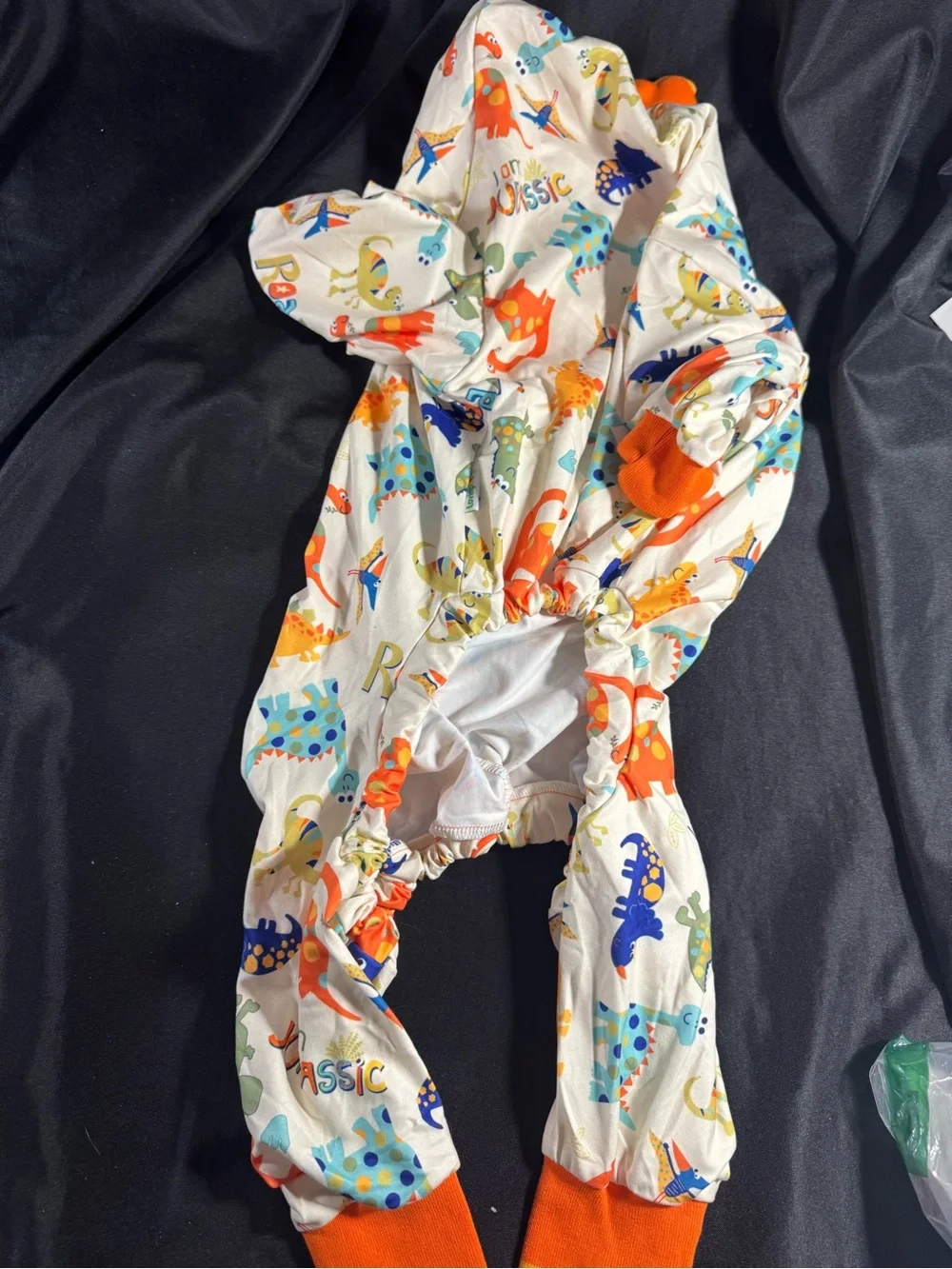 Dinosaur Print Full-Body Dog Pajamas — Orange Trim